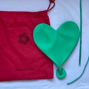 CJ Hendry deflated heart sculpture in Dark Tiffany